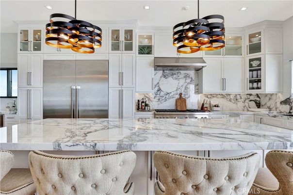 Interior, Kitchen, Marble Walls, Pendant Lights, Recessed Lighting, Stainless Steel Appliances