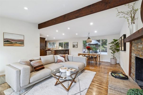 Dining room, Fireplace, Interior, Living room, Pendant Lights, Recessed Lighting, Wooden Beams, Wood Texture Flooring