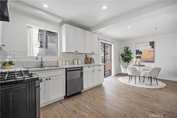 Dining room, Interior, Kitchen, Recessed Lighting, Stainless Steel Appliances, Wood Texture Flooring