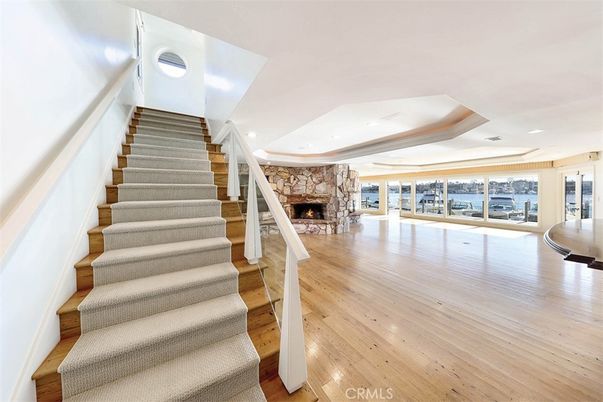 Fireplace, Interior, Recessed Lighting, Water, Wood Texture Flooring