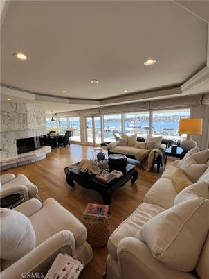 Fireplace, Interior, Living room, Recessed Lighting, Water, Wood Texture Flooring
