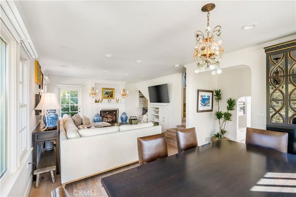 Chandelier, Dining room, Fireplace, Interior, Living room, Recessed Lighting, Wood Texture Flooring