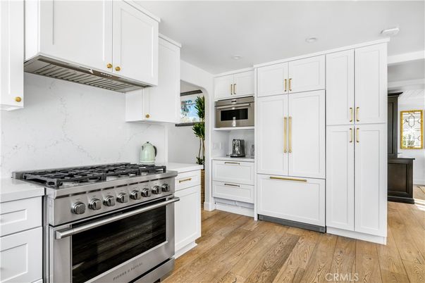 Interior, Kitchen, Marble Walls, Stainless Steel Appliances, Wood Texture Flooring