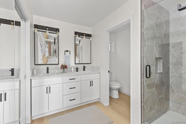 Bathroom, Dual Sink Vanities, Glass Shower, Interior, Wood Texture Flooring