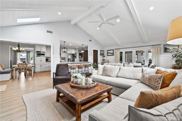 Chandelier, Dining room, Interior, Kitchen, Living room, Pendant Lights, Recessed Lighting, Stainless Steel Appliances, Wood Texture Flooring