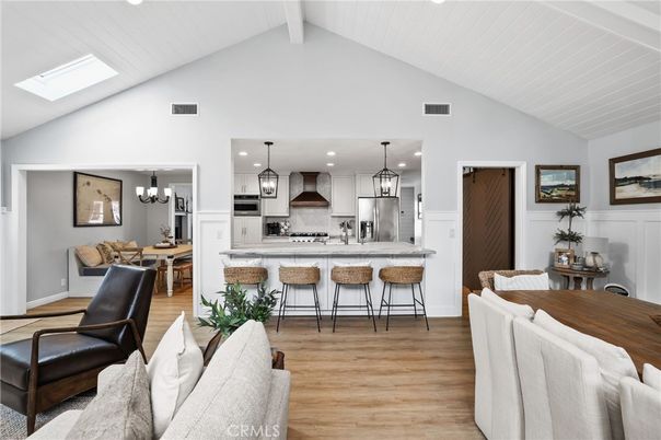 Chandelier, Dining room, Interior, Kitchen, Pendant Lights, Recessed Lighting, Stainless Steel Appliances, Wood Texture Flooring