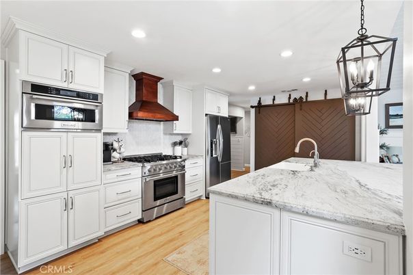 Interior, Kitchen, Pendant Lights, Recessed Lighting, Stainless Steel Appliances, Wood Texture Flooring