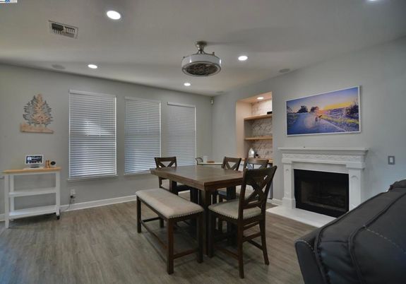 Dining room, Fireplace, Interior, Recessed Lighting, Wood Texture Flooring
