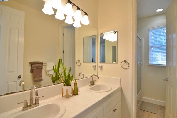 Bathroom, Dual Sink Vanities, Interior, Recessed Lighting, Tile Countertops