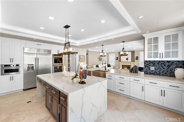 Fireplace, Interior, Kitchen, Pendant Lights, Recessed Lighting, Stainless Steel Appliances