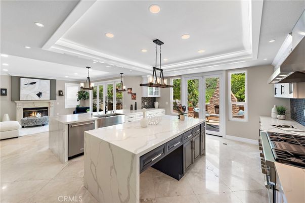 Dining room, Fireplace, Interior, Kitchen, Living room, Pendant Lights, Recessed Lighting, Stainless Steel Appliances