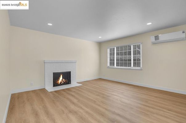 Empty room, Fireplace, Interior, Recessed Lighting, Wood Texture Flooring