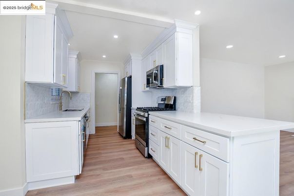 Interior, Kitchen, Recessed Lighting, Stainless Steel Appliances, Wood Texture Flooring