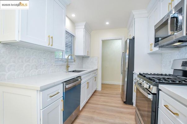 Interior, Kitchen, Recessed Lighting, Stainless Steel Appliances, Wood Texture Flooring