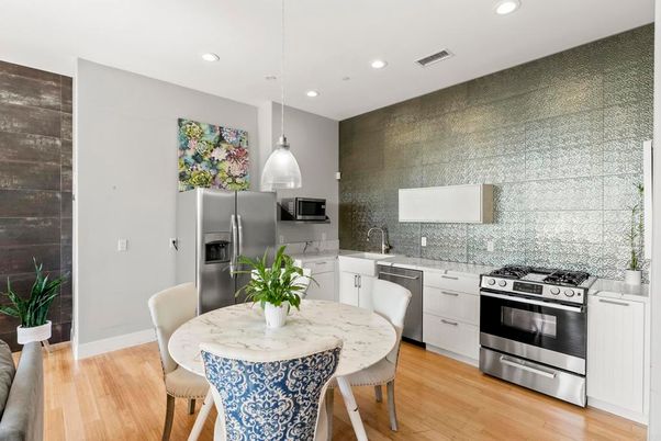 Dining room, Interior, Kitchen, Pendant Lights, Recessed Lighting, Stainless Steel Appliances, Wood Texture Flooring