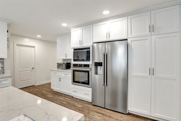 Interior, Kitchen, Recessed Lighting, Stainless Steel Appliances, Wood Texture Flooring