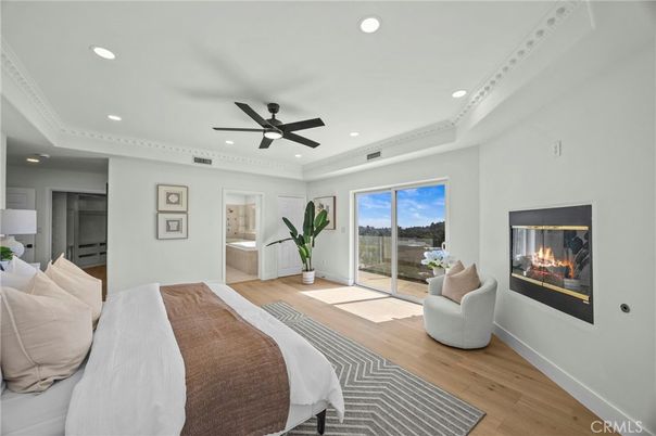 Bedroom, Fireplace, Interior, Recessed Lighting, Wood Texture Flooring