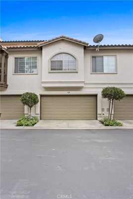 Attached, Exterior, Facade, Mediterranean