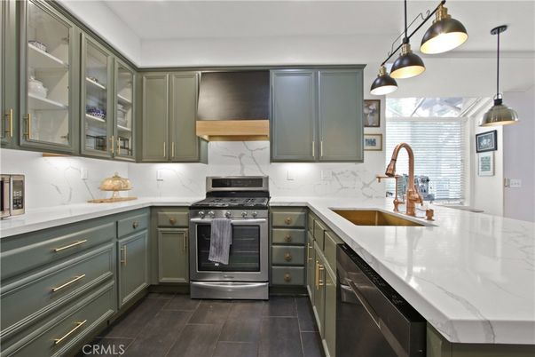 Interior, Kitchen, Marble Walls, Pendant Lights, Stainless Steel Appliances, Wood Texture Flooring