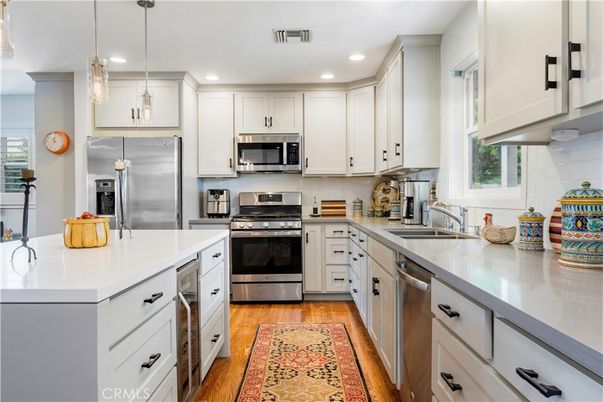 Interior, Kitchen, Pendant Lights, Recessed Lighting, Stainless Steel Appliances, Wood Texture Flooring