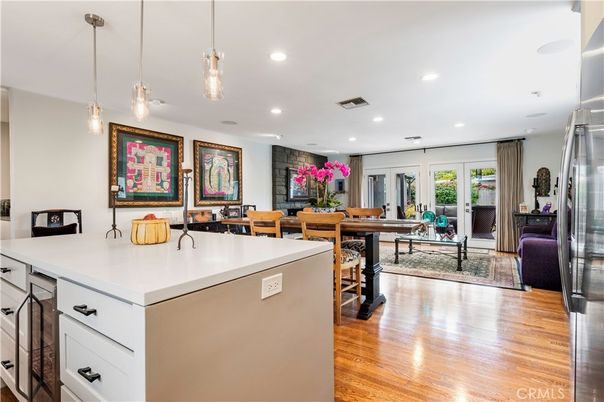 Dining room, Interior, Kitchen, Living room, Pendant Lights, Recessed Lighting, Stainless Steel Appliances, Wood Texture Flooring