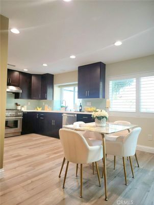Dining room, Interior, Kitchen, Recessed Lighting, Stainless Steel Appliances, Wood Texture Flooring