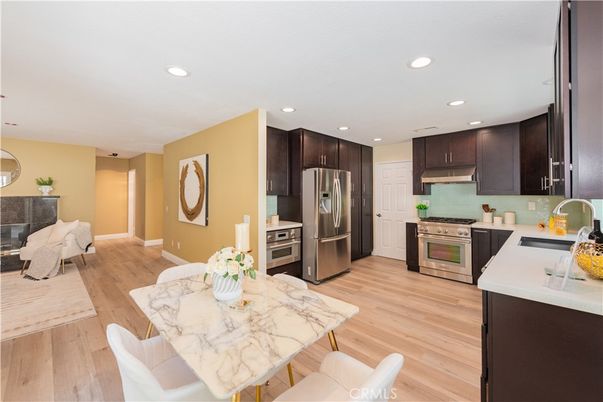 Dining room, Interior, Kitchen, Recessed Lighting, Stainless Steel Appliances, Wood Texture Flooring