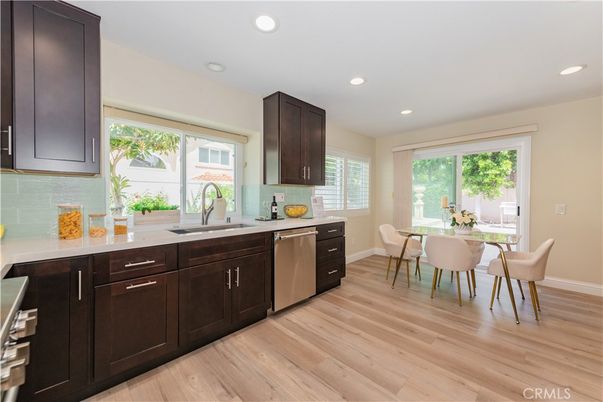 Dining room, Interior, Kitchen, Recessed Lighting, Stainless Steel Appliances, Wood Texture Flooring