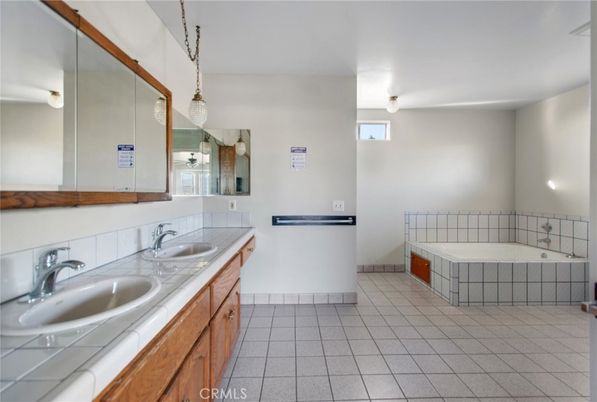 Bathroom, Dual Sink Vanities, Interior, Pendant Lights, Tile Countertops