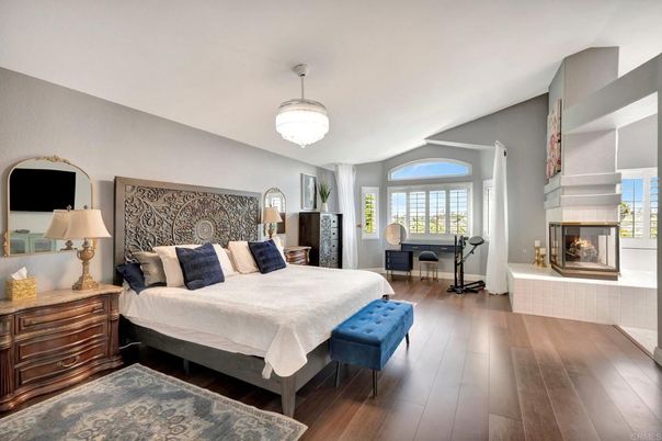 Bedroom, Chandelier, Fireplace, Interior, Wood Texture Flooring