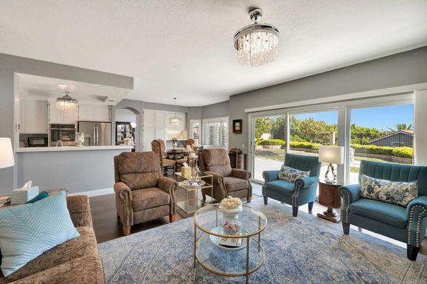 Chandelier, Dining room, Interior, Kitchen, Living room, Stainless Steel Appliances, Wood Texture Flooring