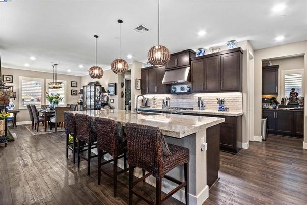 Dining room, Interior, Kitchen, Pendant Lights, Recessed Lighting, Stainless Steel Appliances, Wood Texture Flooring