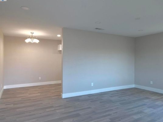 Chandelier, Empty room, Interior, Recessed Lighting, Wood Texture Flooring