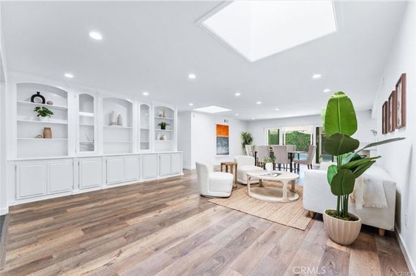Dining room, Fireplace, Interior, Living room, Recessed Lighting, Wood Texture Flooring