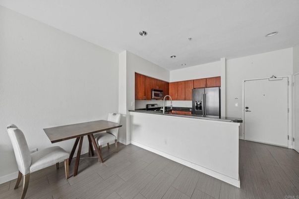 Dining room, Interior, Kitchen, Recessed Lighting, Stainless Steel Appliances, Wood Texture Flooring