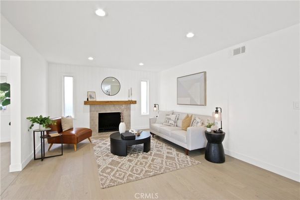 Fireplace, Interior, Living room, Recessed Lighting, Wood Texture Flooring
