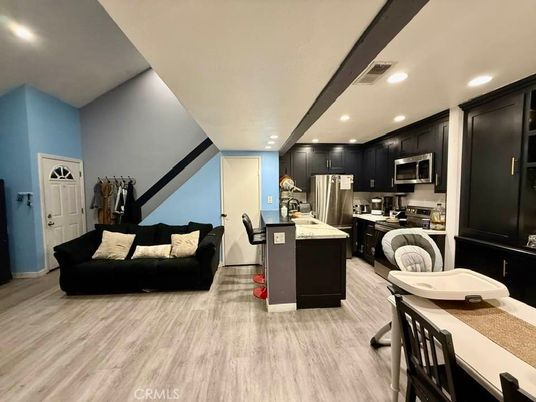 Dining room, Interior, Kitchen, Living room, Recessed Lighting, Stainless Steel Appliances, Wood Texture Flooring