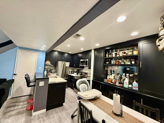Dining room, Interior, Kitchen, Recessed Lighting, Stainless Steel Appliances, Wood Texture Flooring