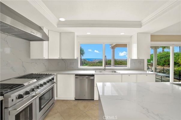 Interior, Kitchen, Marble Walls, Recessed Lighting, Stainless Steel Appliances, Water