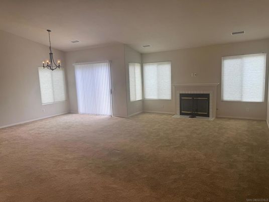 Chandelier, Empty room, Fireplace, Interior