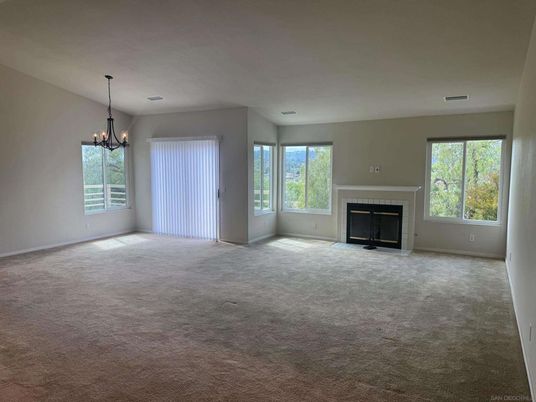 Chandelier, Empty room, Fireplace, Interior