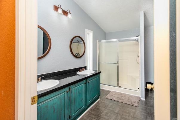 Bathroom, Dual Sink Vanities, Glass Shower, Interior, Wood Texture Flooring