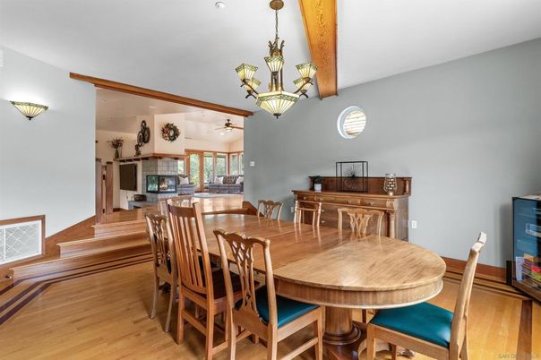 Chandelier, Dining room, Fireplace, Interior, Pendant Lights, Wooden Beams, Wood Texture Flooring
