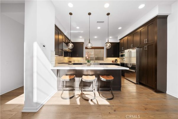 Interior, Kitchen, Pendant Lights, Recessed Lighting, Stainless Steel Appliances, Wood Texture Flooring