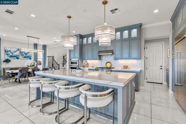 Chandelier, Dining room, Interior, Kitchen, Marble, Pendant Lights, Recessed Lighting, Stainless Steel Appliances