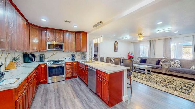 Dining room, Interior, Kitchen, Living room, Pendant Lights, Recessed Lighting, Stainless Steel Appliances, Wood Texture Flooring