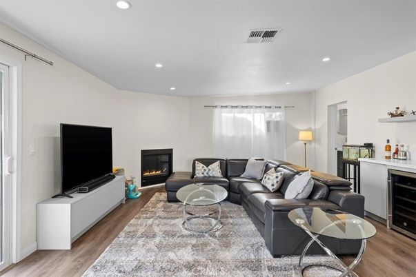 Fireplace, Interior, Living room, Recessed Lighting, Wood Texture Flooring