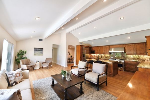 Dining room, Interior, Kitchen, Living room, Recessed Lighting, Stainless Steel Appliances, Wood Texture Flooring