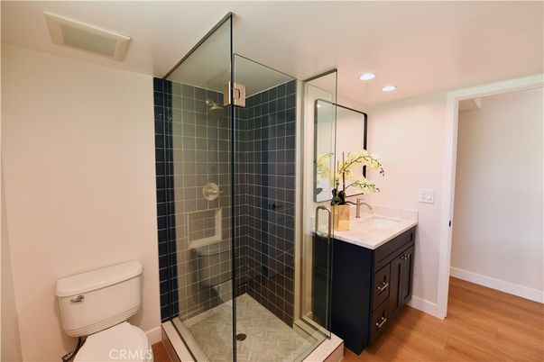 Bathroom, Glass Shower, Interior, Recessed Lighting, Wood Texture Flooring