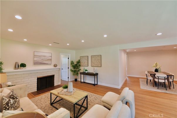 Dining room, Fireplace, Interior, Living room, Recessed Lighting, Wood Texture Flooring